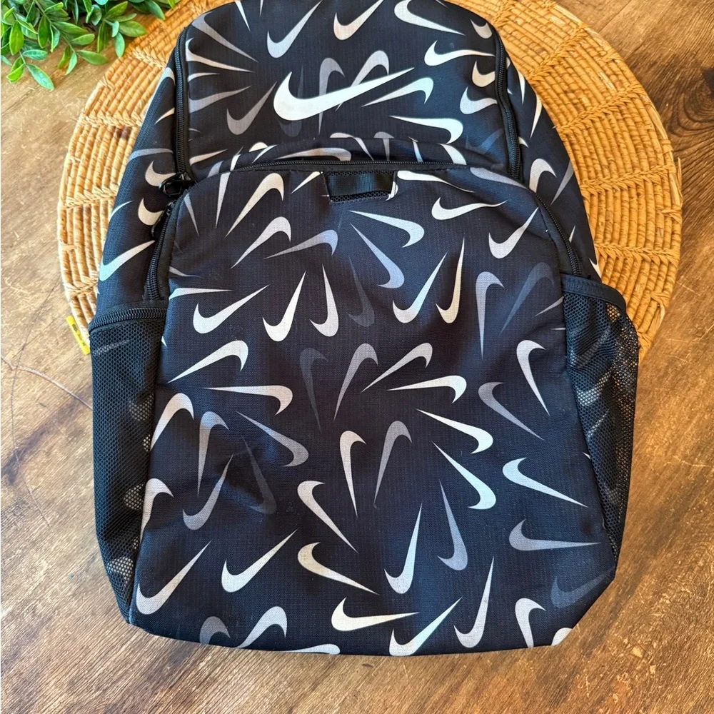 Nike Black and Gray Swoosh Logo Pattern Backpack